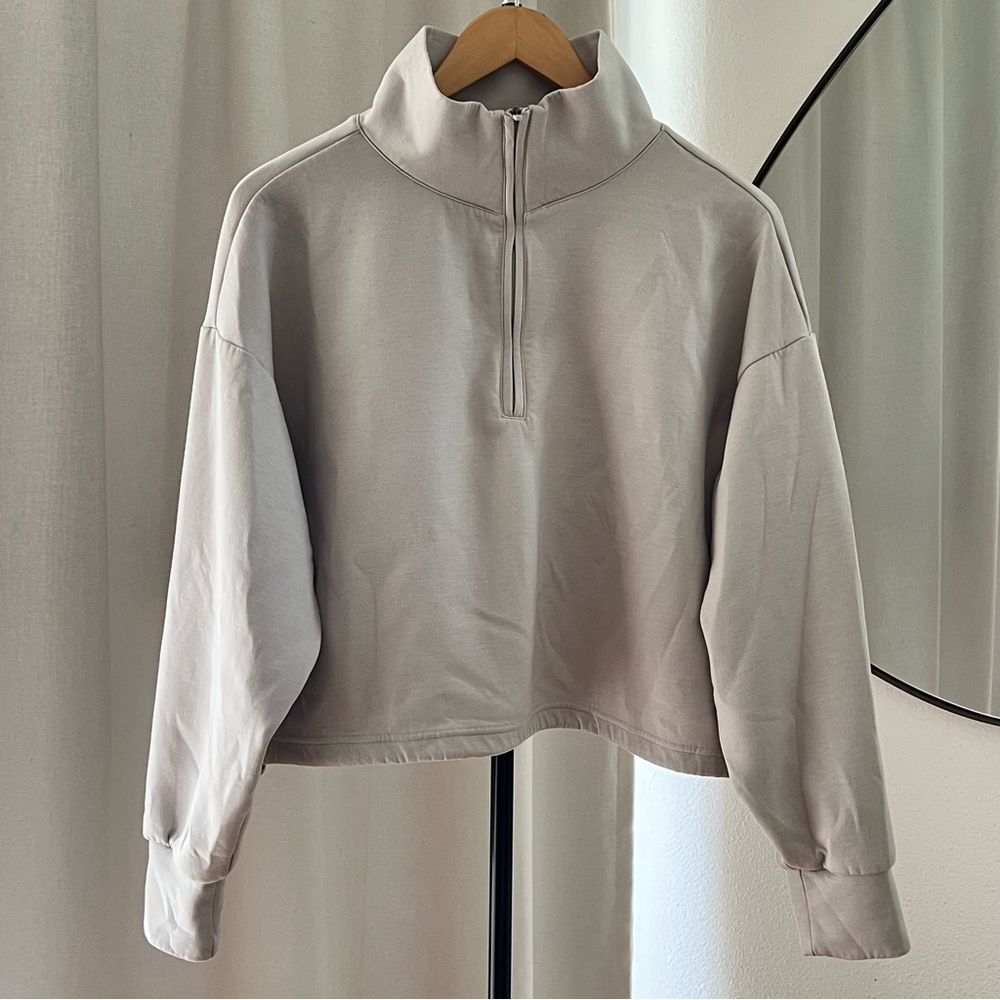 Cropped long sleeve athletic pullover sweater